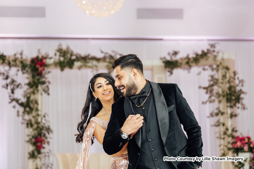 Indian bride and groom enjoying on dance floor
