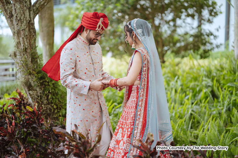 Indian wedding couple possing for outdoor photoshoot