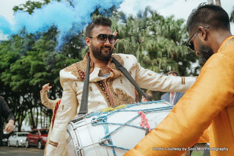 Groom enjoys Playing Dhol