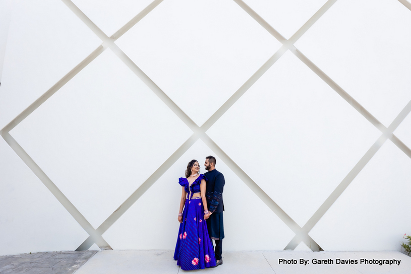 Indian wedding couple looks happy