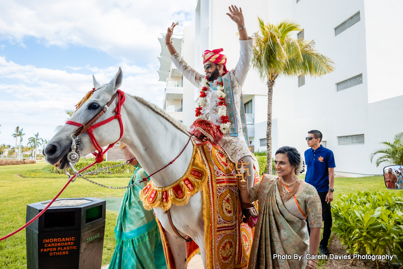 Indian wedding groom dancing during Baraat Pocession