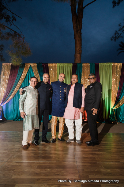 Indian family member in traditional attire, exuding joy and pride at an Indian wedding ceremony