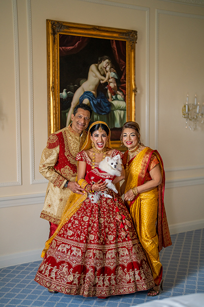 Indian bride with her pet and family