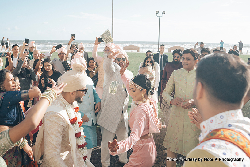 Indian bride and groom enjoying on dance floor