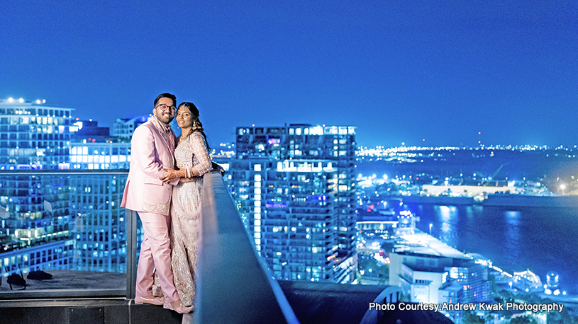 Indian wedding couple posing for photoshoot in outdoor location
