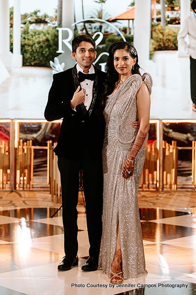 Newly weds couple looking stunning in reception attire