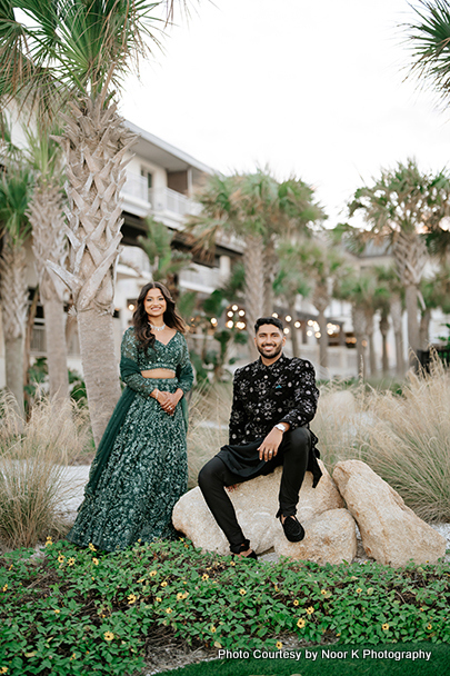 Indian bride and groom smiling while photoshoot