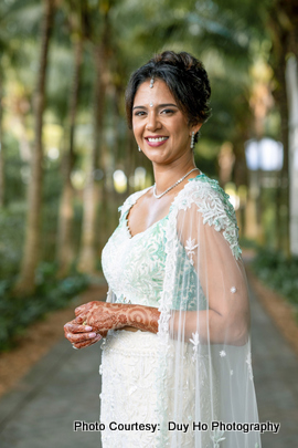 Indian bride posing for outdoor photoshoot Indian bride posing for outdoor photoshoot