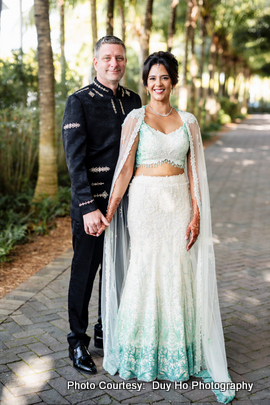 Ekta and Dan smiling at each other