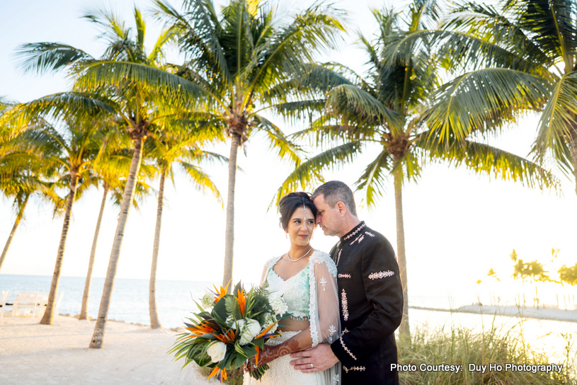 Bride and groom enjoying an outdoor photoshoot