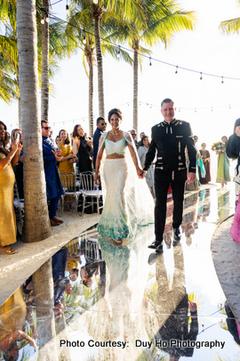 Indian bride and groom enters for wedding