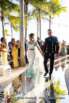 Entry of indian bride and groom for wedding