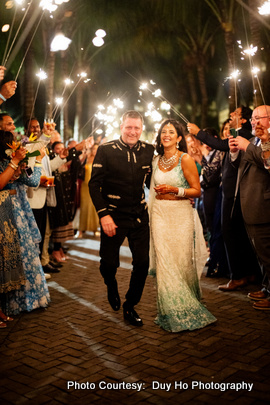 Couple surrounded by serene ocean scenery during their vow exchange