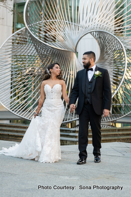 Indian weding couple posing in outdoor location Indian weding couple posing in outdoor location