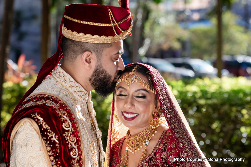 Ashley and Justin sharing a kiss during their sparkler exit at The Royal Crest Room wedding. Ashley and Justin sharing a kiss during their sparkler exit at The Royal Crest Room wedding.