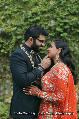  A beautiful outdoor portrait of a newlywed couple celebrating their wedding day with scenic natural surroundings.
