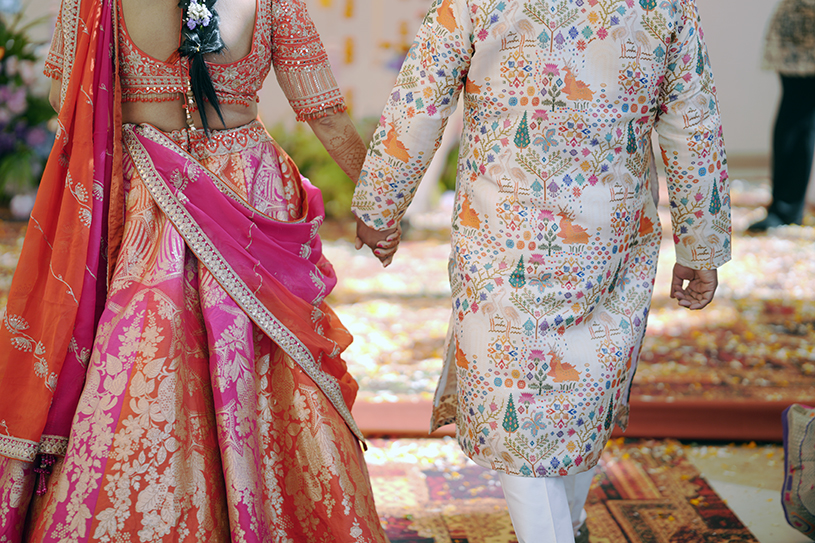 Radhika and Krishan Walking Together at Anniversary Event