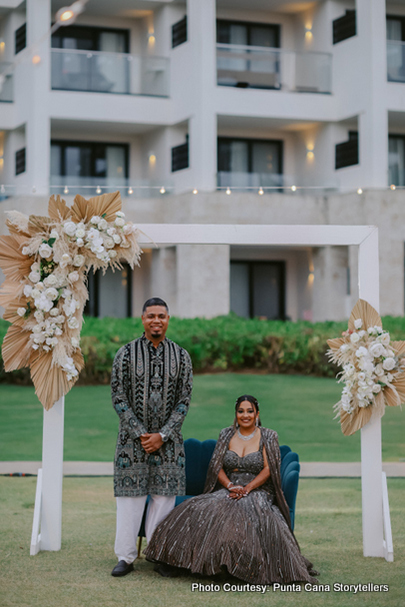 Indian bride and groom possing for photoshoot