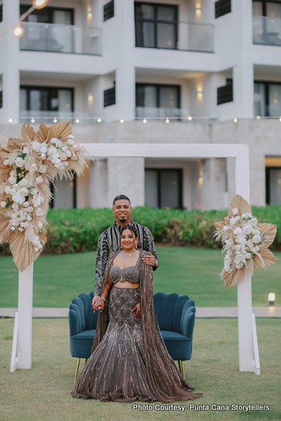 Indian bride and groom look gorgeous in reception attire